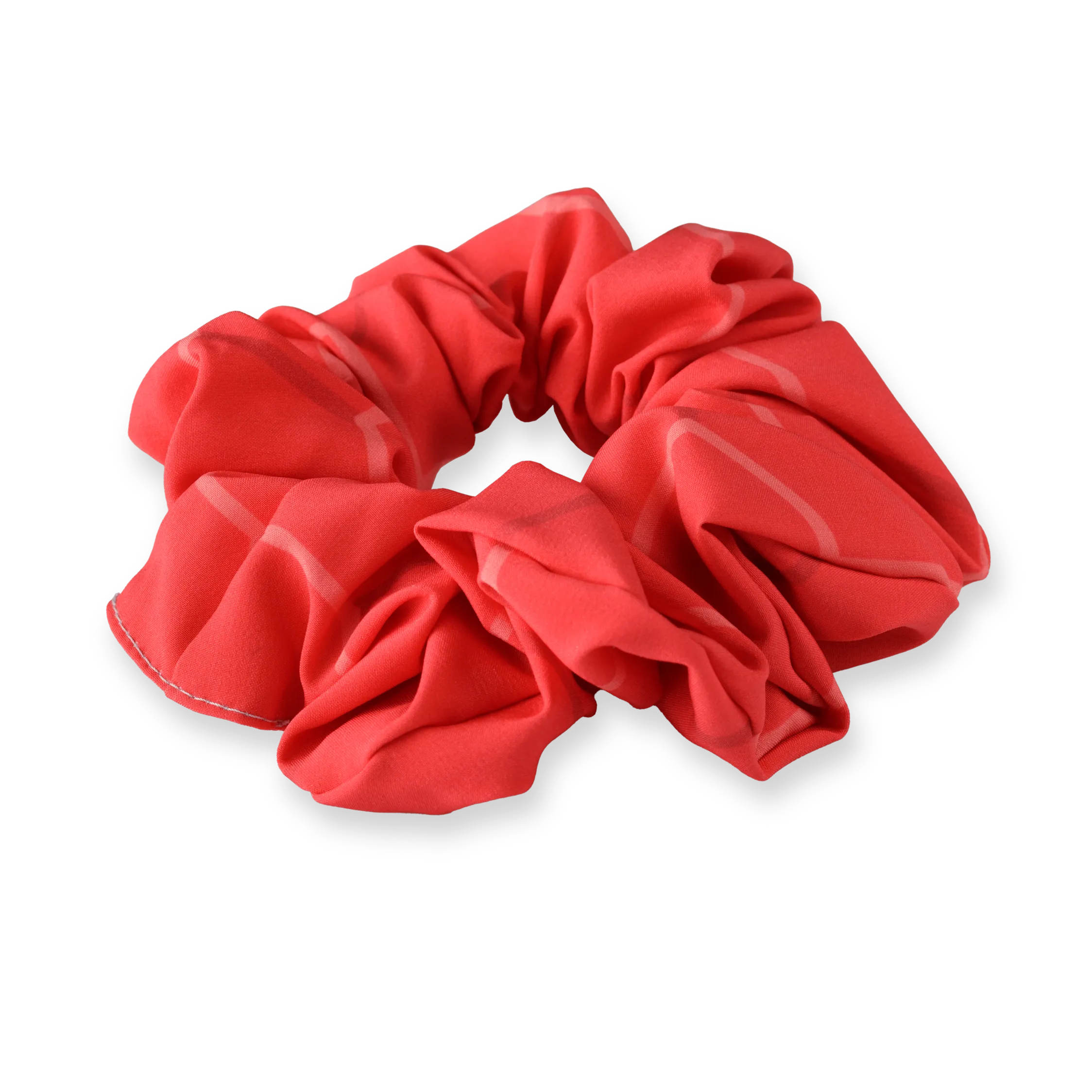 Een rood scrunchie van zacht materiaal met een casual ontwerp.
